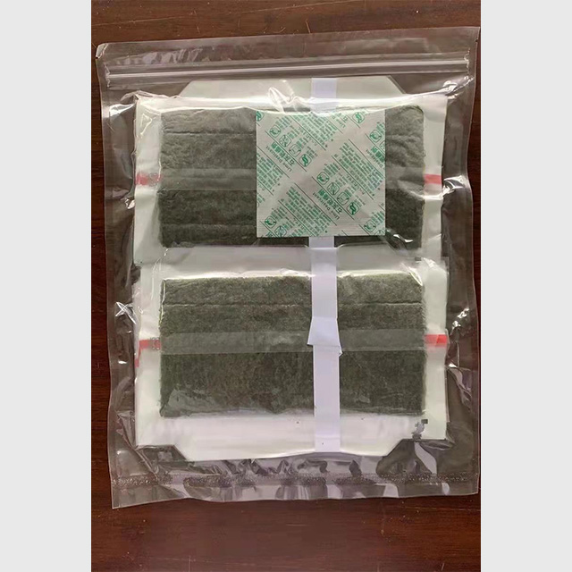 Rollo de mano de 100 piezas Sushi Nori Algas medio corte Rollo de arroz y vegetales